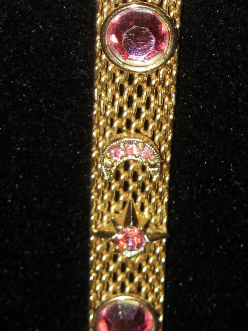 KIRKS FOLLY SIGNED, RARE, VINTAGE STARS AND MOONS BRACELET WITH FOLD OVER CLASP